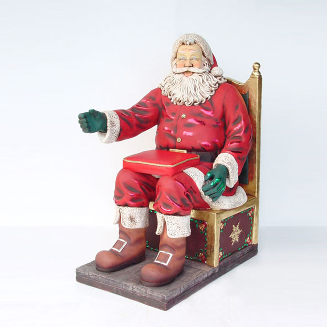 Santa Claus in resin seated on his throne photocall